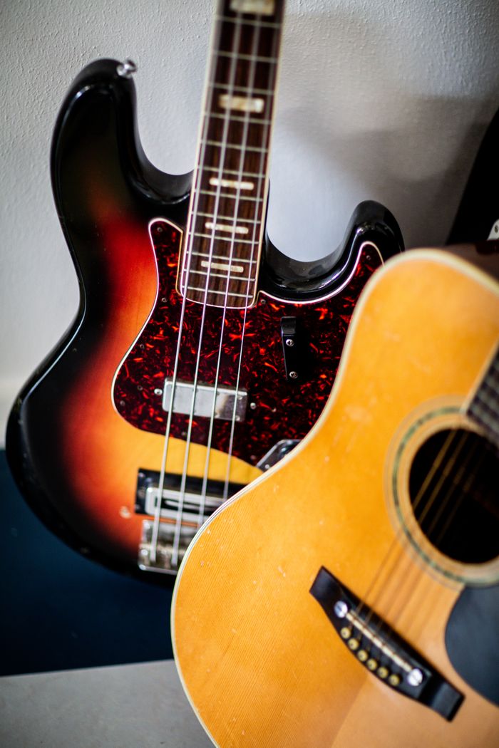 Services Close-up of electric and acoustic guitars showcasing their unique designs.